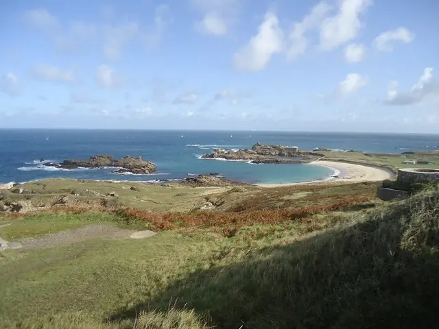 The curve of Saye Bay seen from above the shore on Alderney.