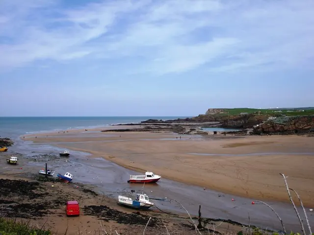 Summerleaze Beach, Bude In the foreground, the small stream (with some from water from the canal lock gates outlet) meanders across the sands at low tide.