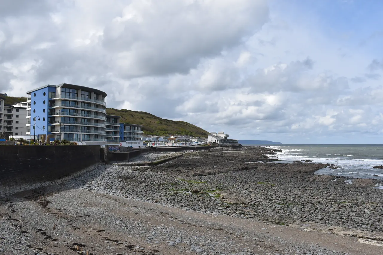 The seafront at Westward Ho! on the north coast of Devon, England. This view is looking west.