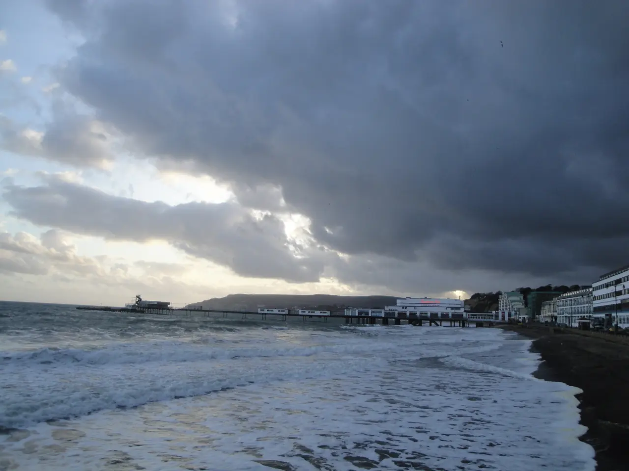 The beach at Sandown , Isle of Wight , seen from the Esplanade on a very grey day in November 2011.