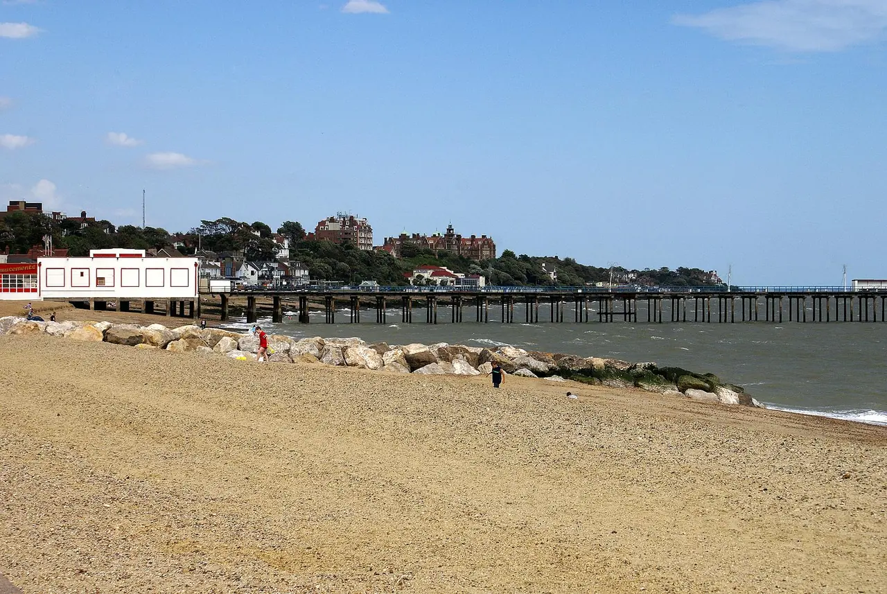 Felixstowe, Suffolk, England. Shows the beach, the pier and in the background buildings on the sea front. Photo taken on 14 August 2008.