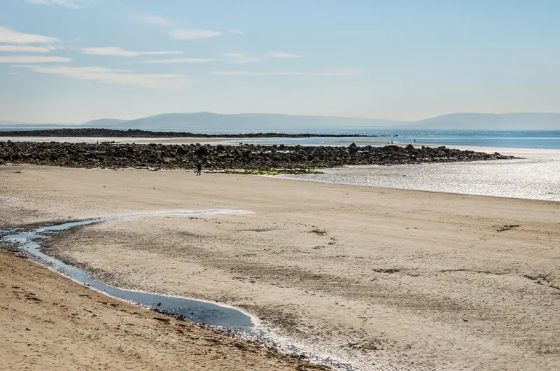 Exposed sand and shallow channels at Silverstrand near Barna.