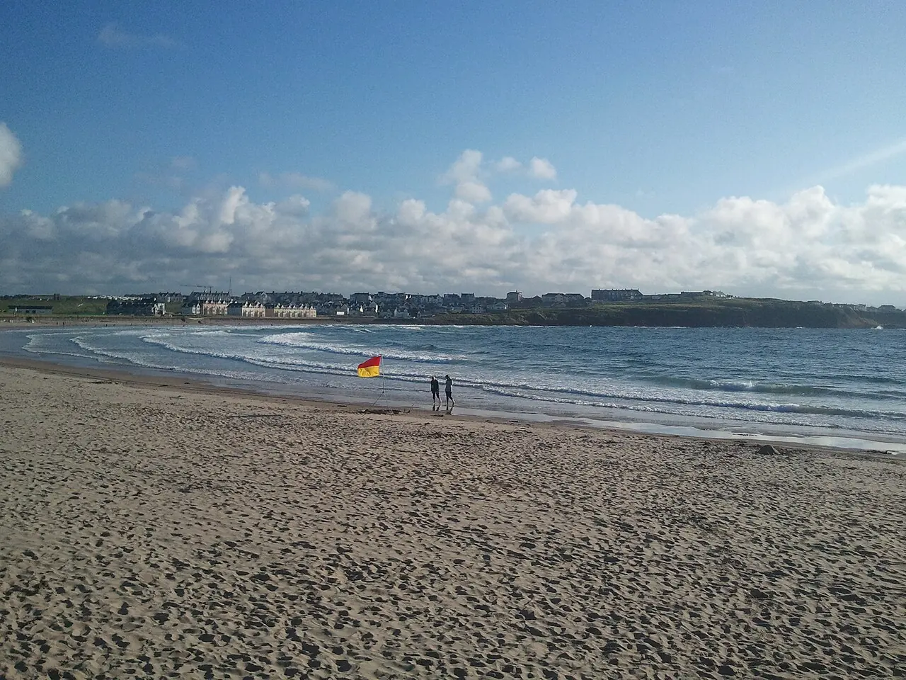 The "East Strand" beach in Portrush , Northern Ireland .
