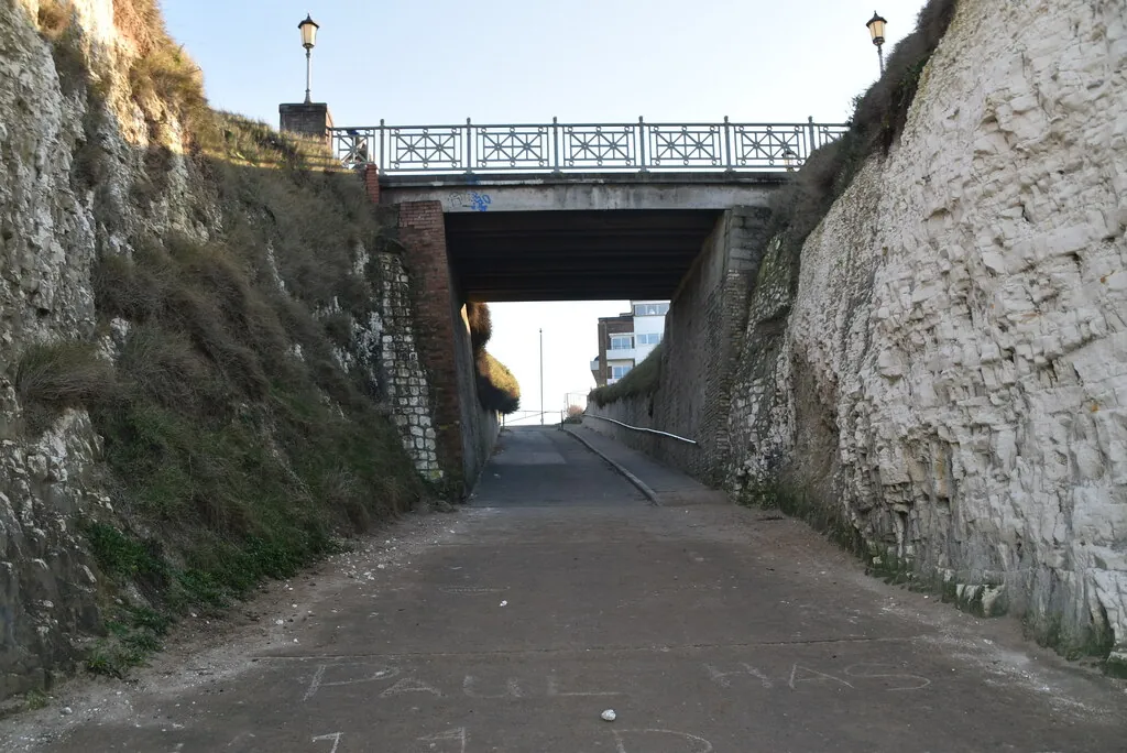 The paved approach through the chalk cliffs at Sacketts Gap